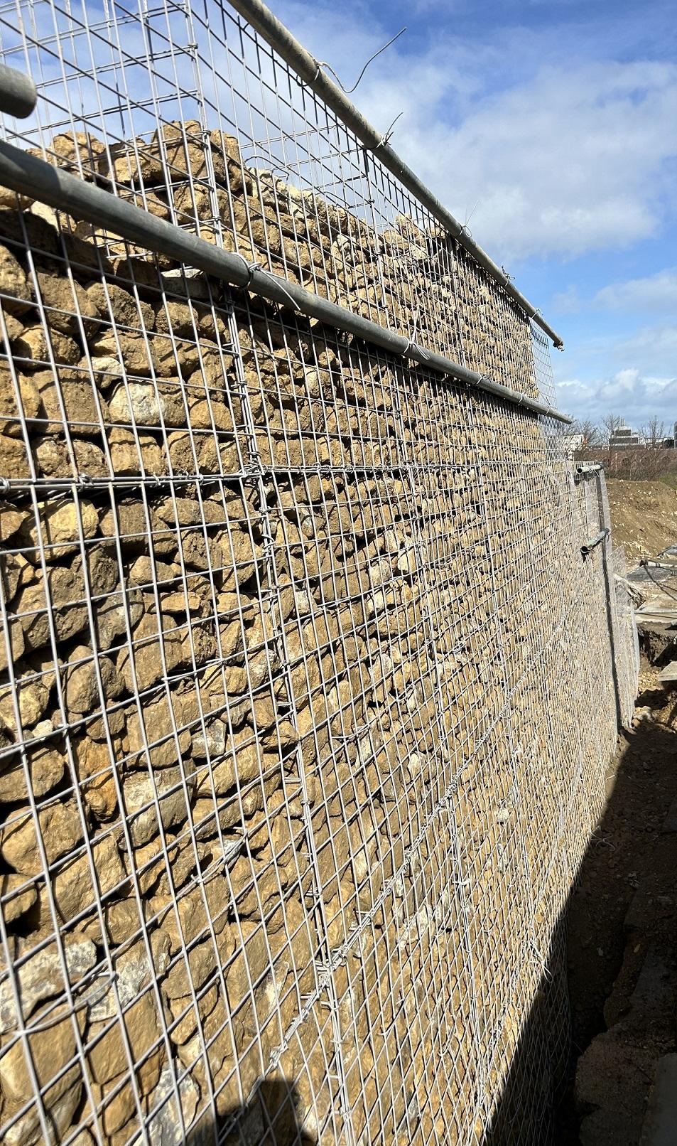 Gabion basket retaining wall